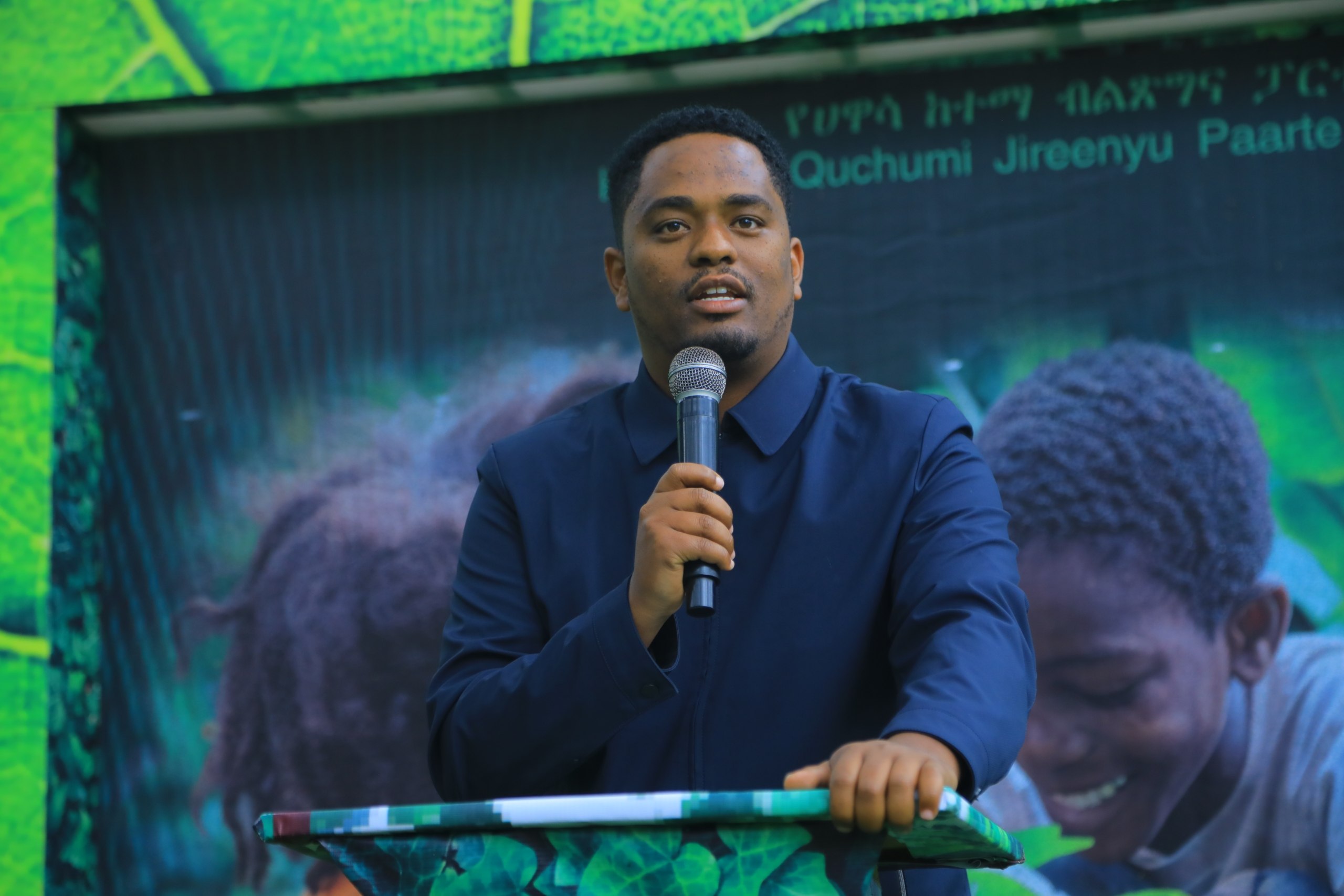 A speaker addressing participants at a GSI event